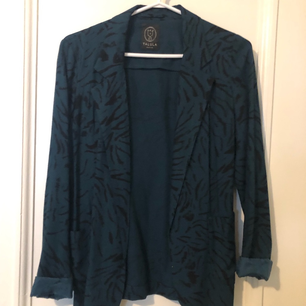 Teal suit jacket. Very cool fit, looks very elegant.